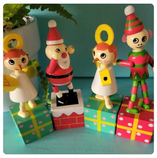 Traditional wooden push up Christmas toys